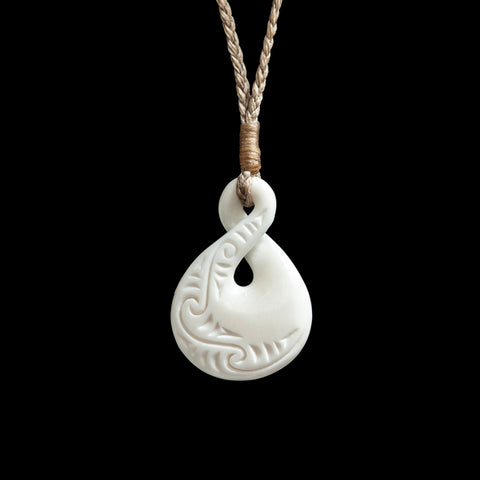 Small Carved Pikorua Twist, handcrafted bone pendant