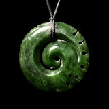 Pounamu notched Koru, handcrafted jade pendant