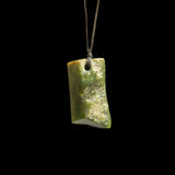 Jade Toki hand carved pendant by Nick and Mady