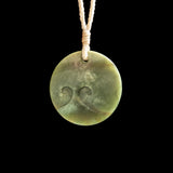 Jade disc pendant with korus by Nick and Mady