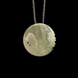 Jade disc pendant with korus by Nick and Mady