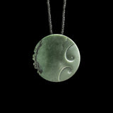 Jade disc pendant with korus by Nick and Mady