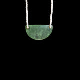 Small hand carved Jade Breast Plate style pendant by Madelyne Gourdin