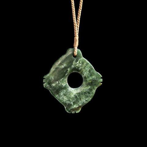 Handmade notched Jade disc by Alex Sands