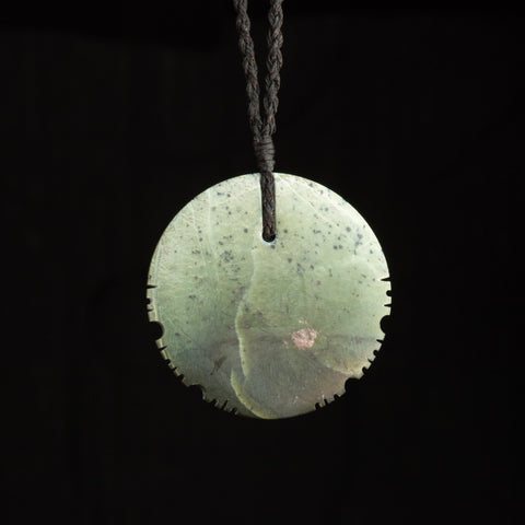Jade disc pendant by Nick and Mady