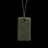 Hand carved Hei Toki jade pendant by Nick and Mady