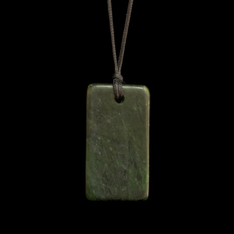Hand carved Hei Toki jade pendant by Nick and Mady