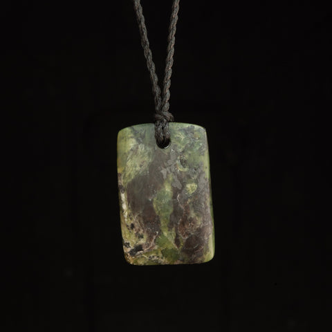 Hand carved Hei Toki bowenite pendant by Nick and Mady