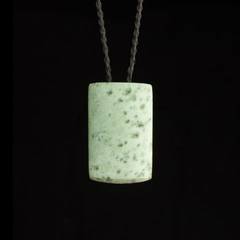 Hand carved Hei Toki jade pendant by Nick and Mady