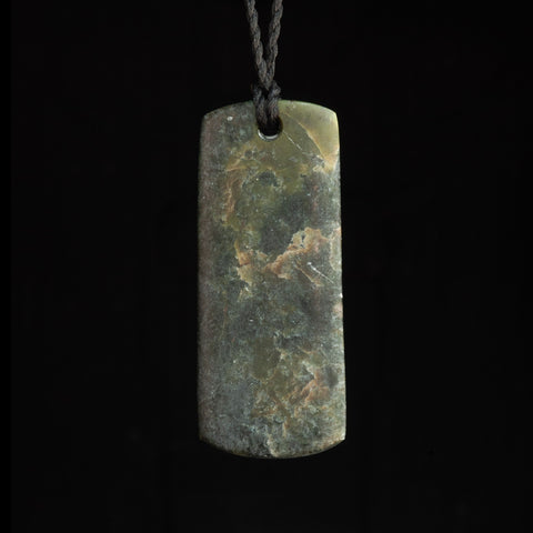 Hand carved Hei Toki jade pendant by Nick and Mady