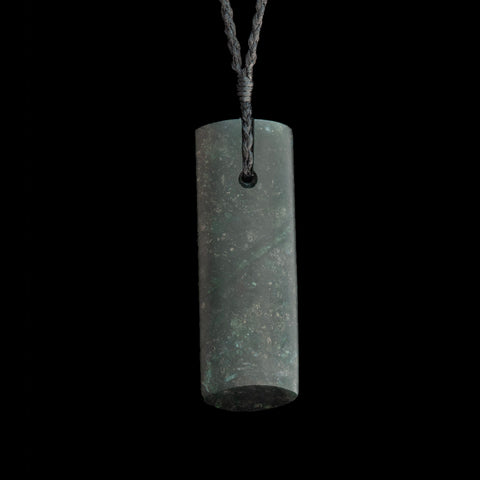 Hand carved Hei Toki jade pendant by Nick and Mady