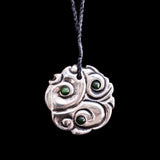 White bronze Koru Disc with inset Jade Drops by Nick and Mady