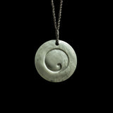 Jade disc pendant with korus by Nick and Mady