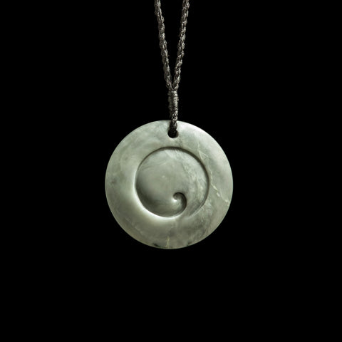 Jade disc pendant with korus by Nick and Mady