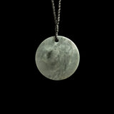 Jade disc pendant with korus by Nick and Mady