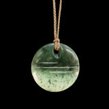 Jade disc pendant by John Kerwin
