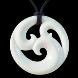 Maori style koru bone carving pendant from New Zealand