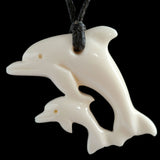 Playing dolphins bone carving