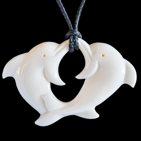 Playing dolphins bone carving necklace