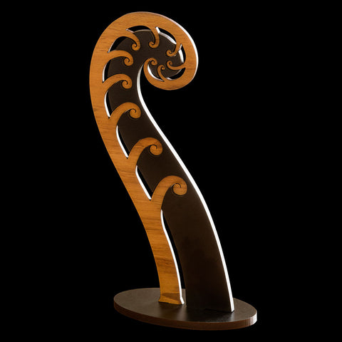 Maori style wooden Koru sculpture from New Zealand