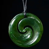 Small pounamu double Koru, handcrafted jade pendant